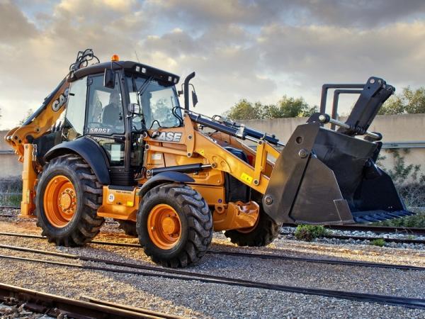 Аренда экскаватора-погрузчика Красногорск | Заказать недорого